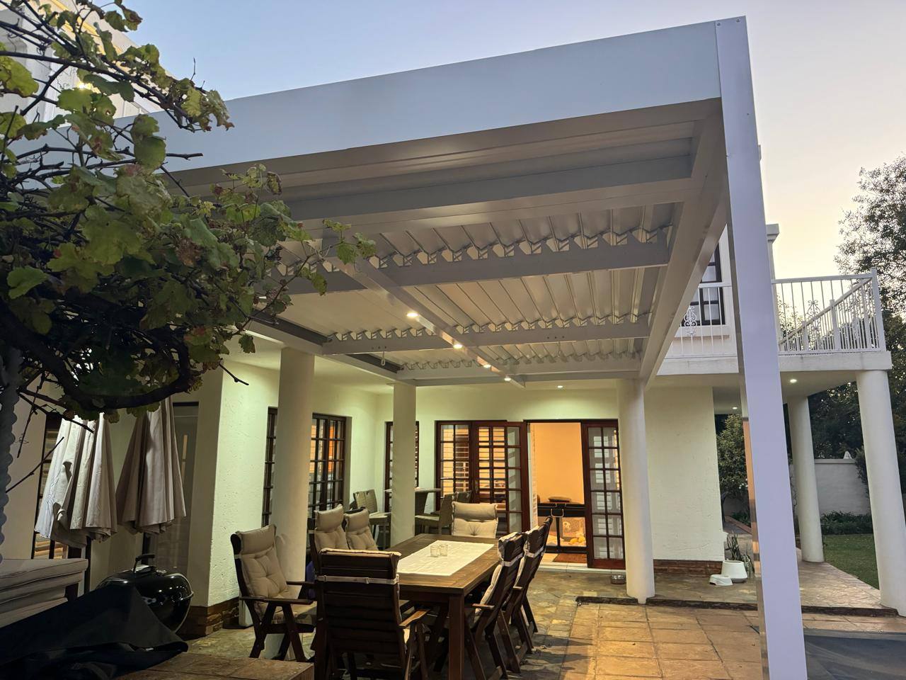 White Louvre with Downlights at Dusk — Benoni