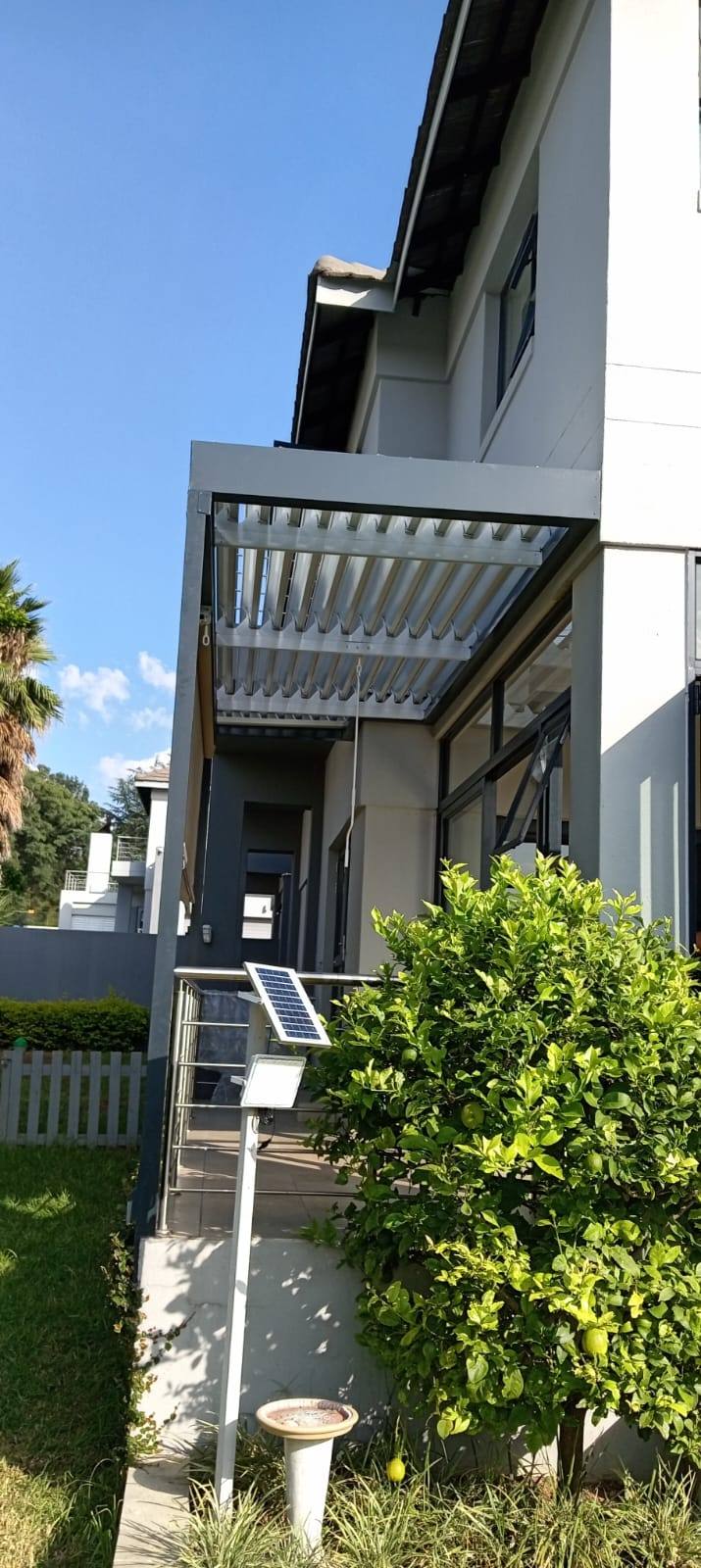 Louvre Roof with a Drop Blind — Bryanston