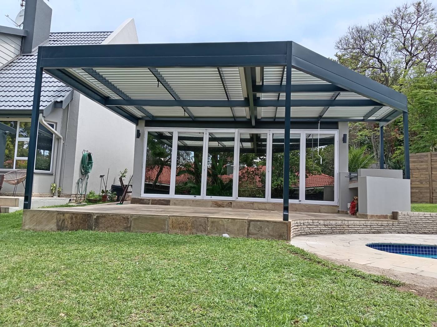 Louvre Roof over a Raised Terrace — Lonehill
