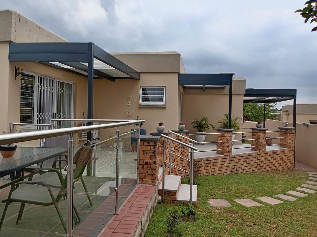 The Northriding awning seen along the raised patio and balustrade