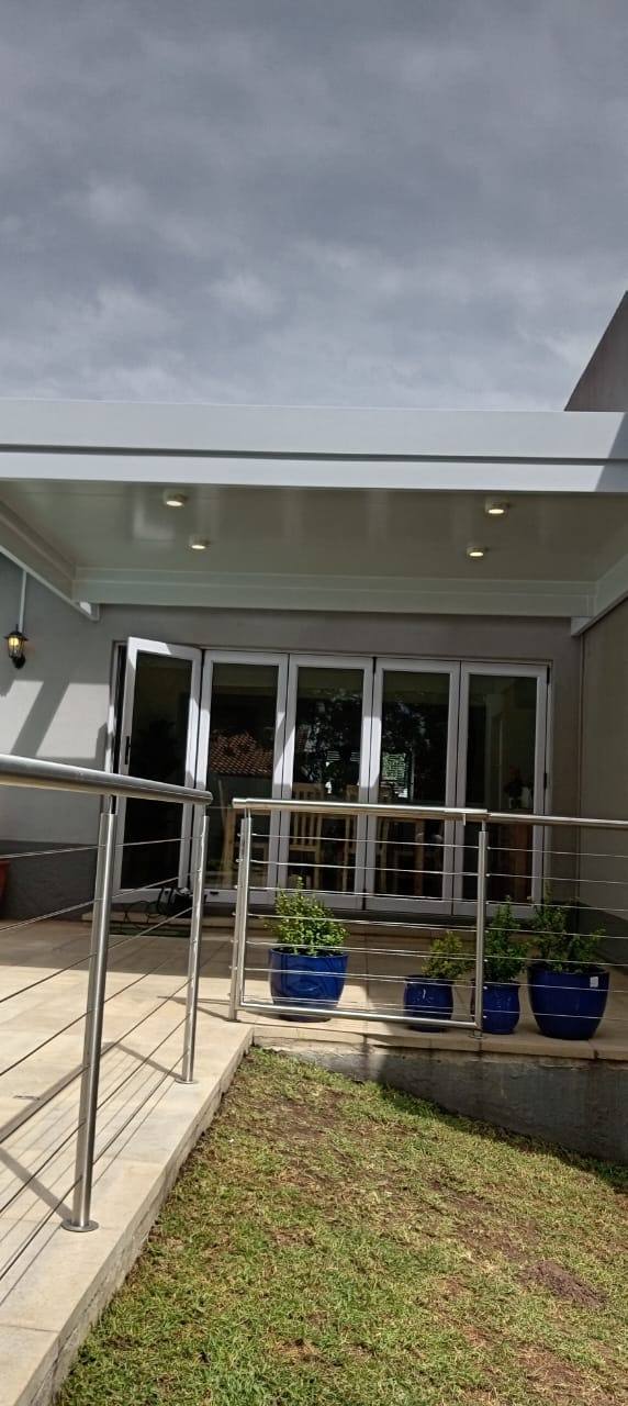 Recessed downlights and the glazed outer edge of the Sandown patio ceiling