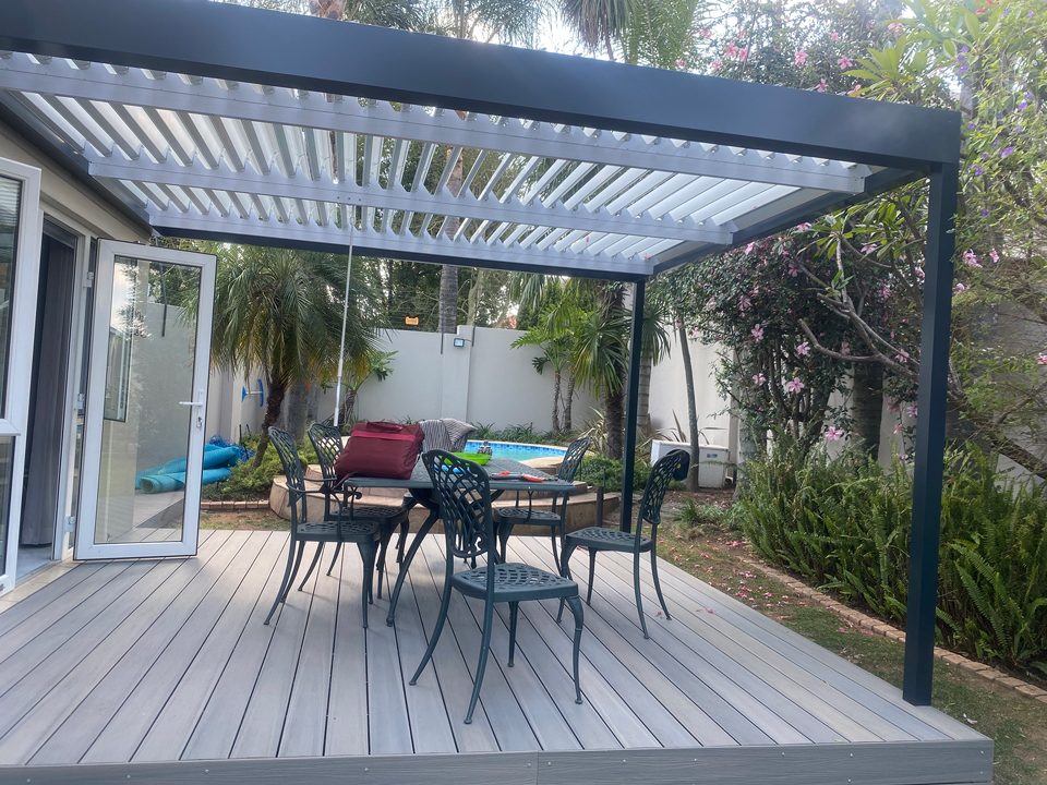 Modern enclosed patio at dusk